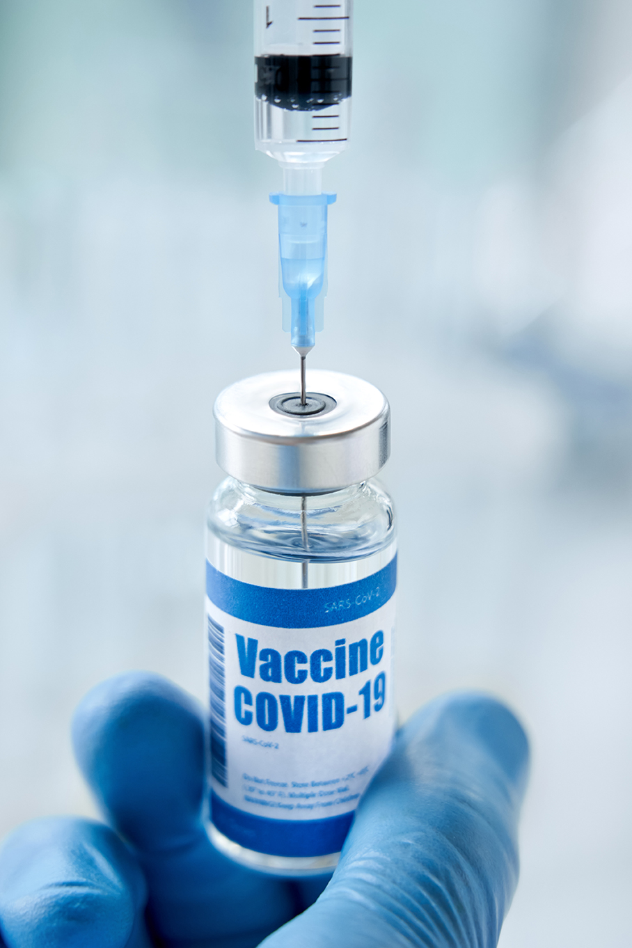 vaccine medication bottle syringe